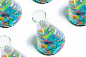 Colourful balls in lab jars